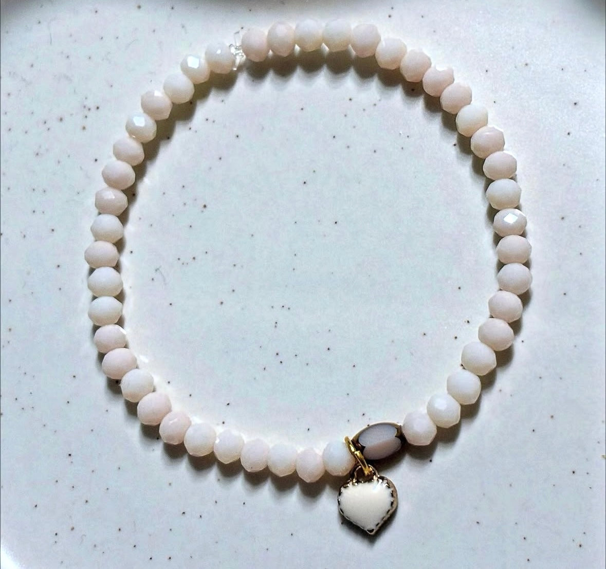 Rose gold bracelet with heart pendant