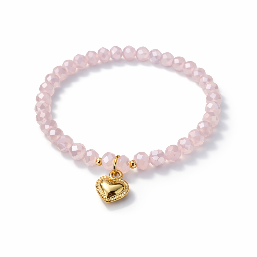 Pink bracelet with heart pendant and gold details