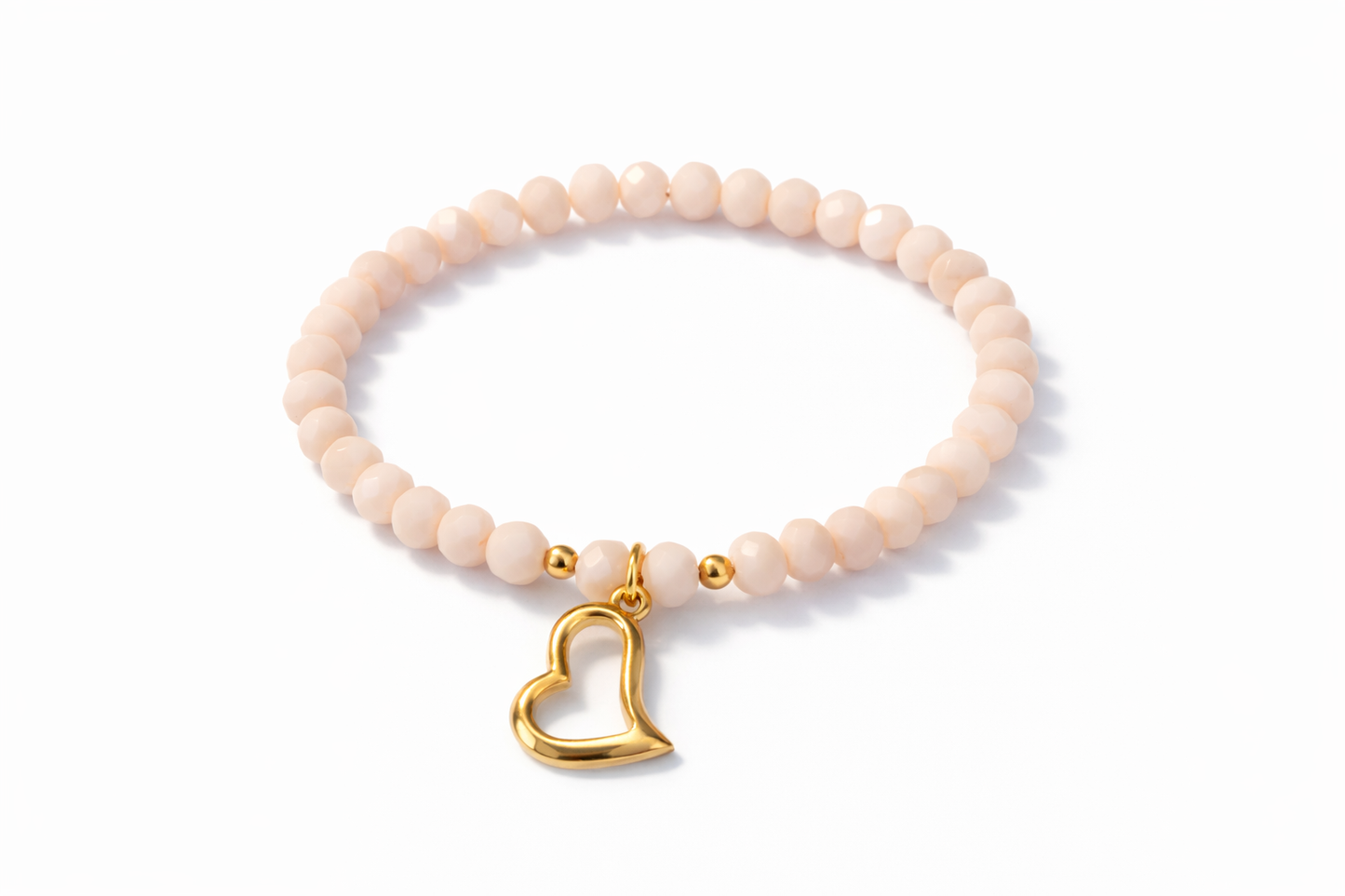 Bracelet with heart pendant and gold details