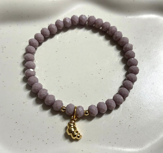 Armband mit Croissant und goldenen Details