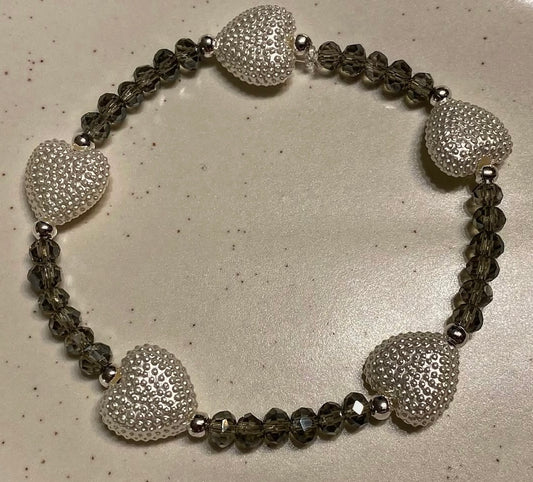 Armband mit Herzperlen 