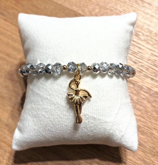 Silver bracelet with ballerina pendant and gold details