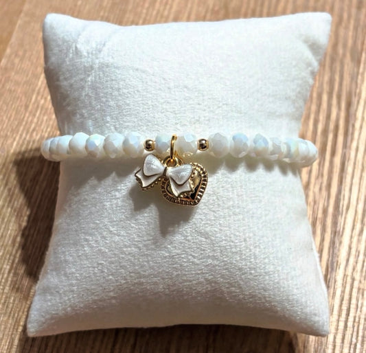 White bracelet with bow and heart