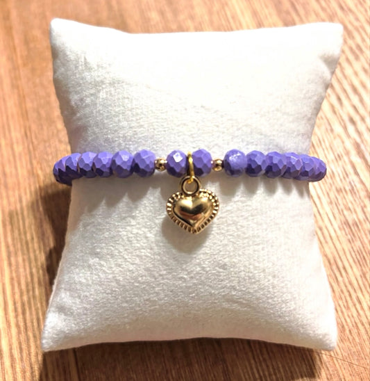 Purple bracelet with heart pendant