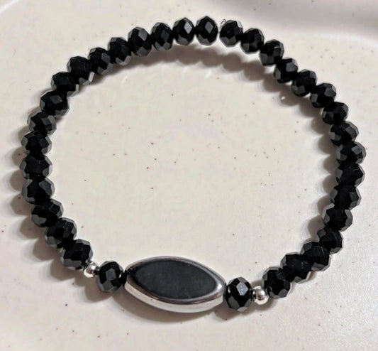 Elegant black bracelet with silver details