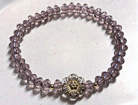 Bracelet with flower and gold details