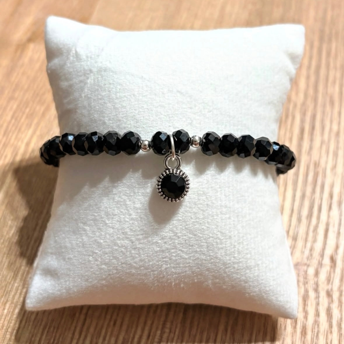 Black bracelet with pendant