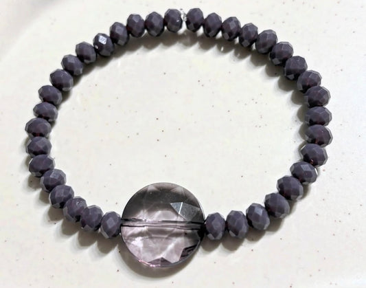 Violet bracelet with elegant pendant