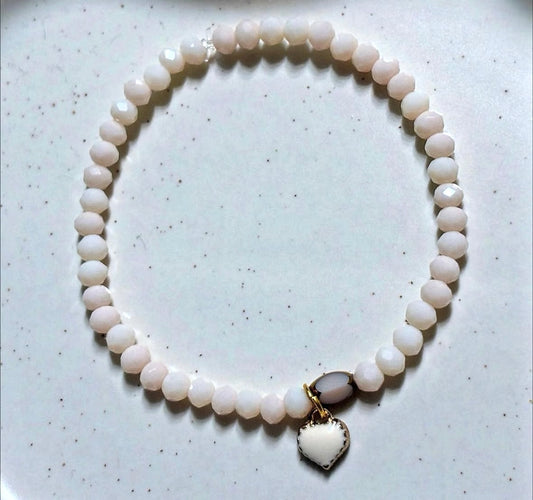 Rose gold bracelet with heart pendant