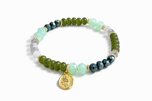 Green bracelet with floral pendant