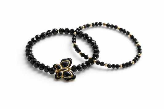 Armband Set schwarz mit goldene Details und Schmetterling