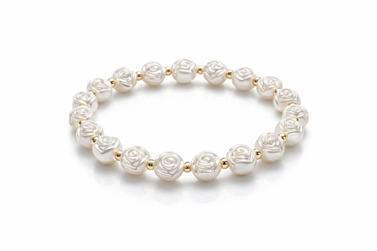 Armband mit Rosenperlen und goldenen Details