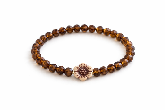 brown bracelet with flower