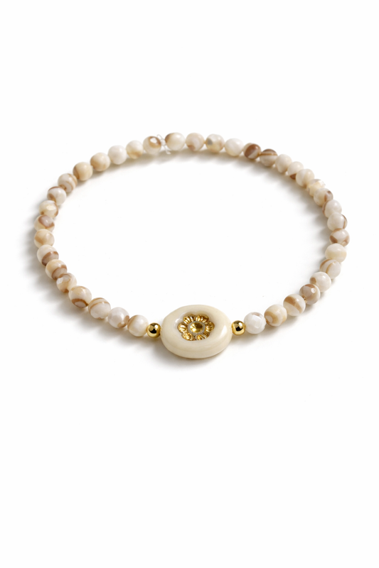 Bracelet made of natural shell pearls and gold details