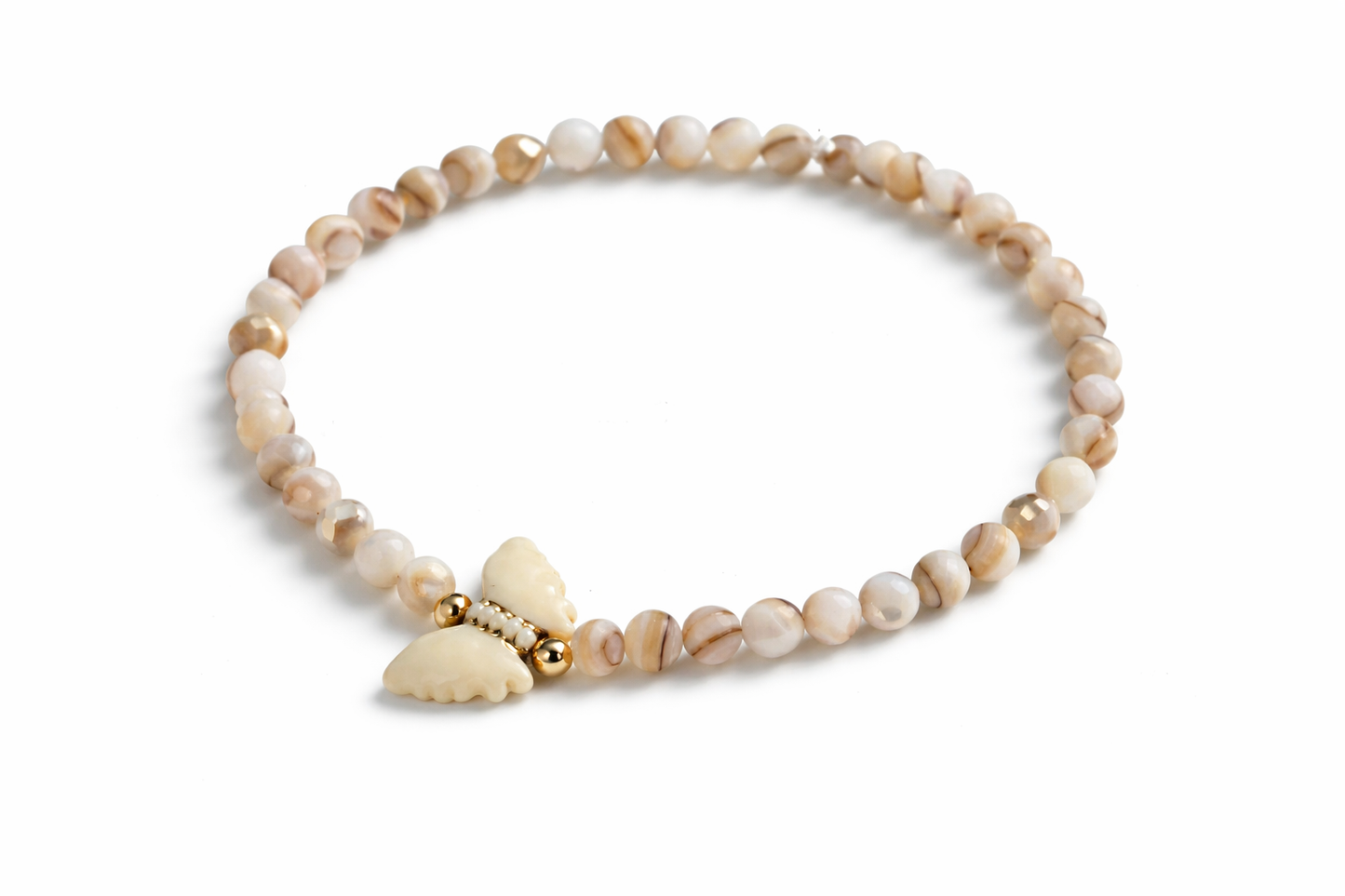 Bracelet made of natural shell pearls and a small butterfly with gold details