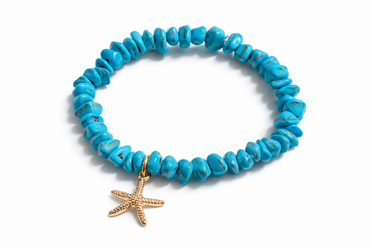 Bracelet made of turquoise stone beads and a golden starfish pendant