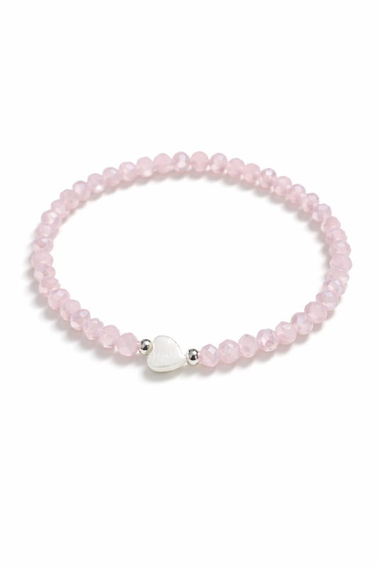 Pink bracelet with heart-shaped shell pearl