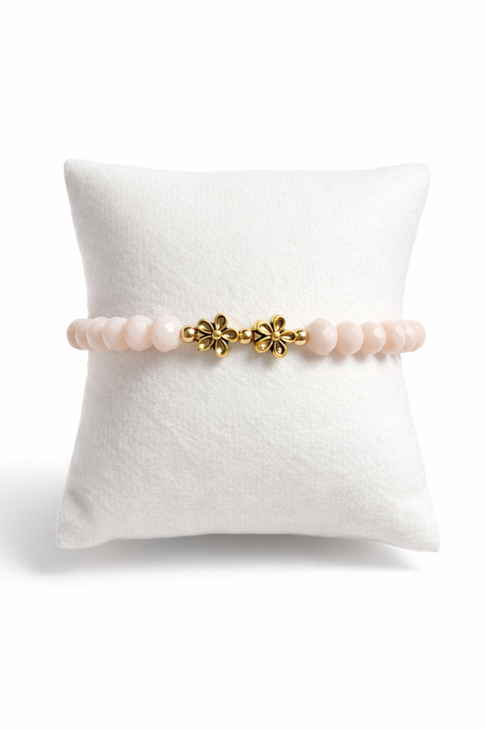 Cream bracelet with golden flowers