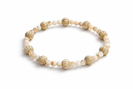 Bracelet made of natural shell pearls and gold details