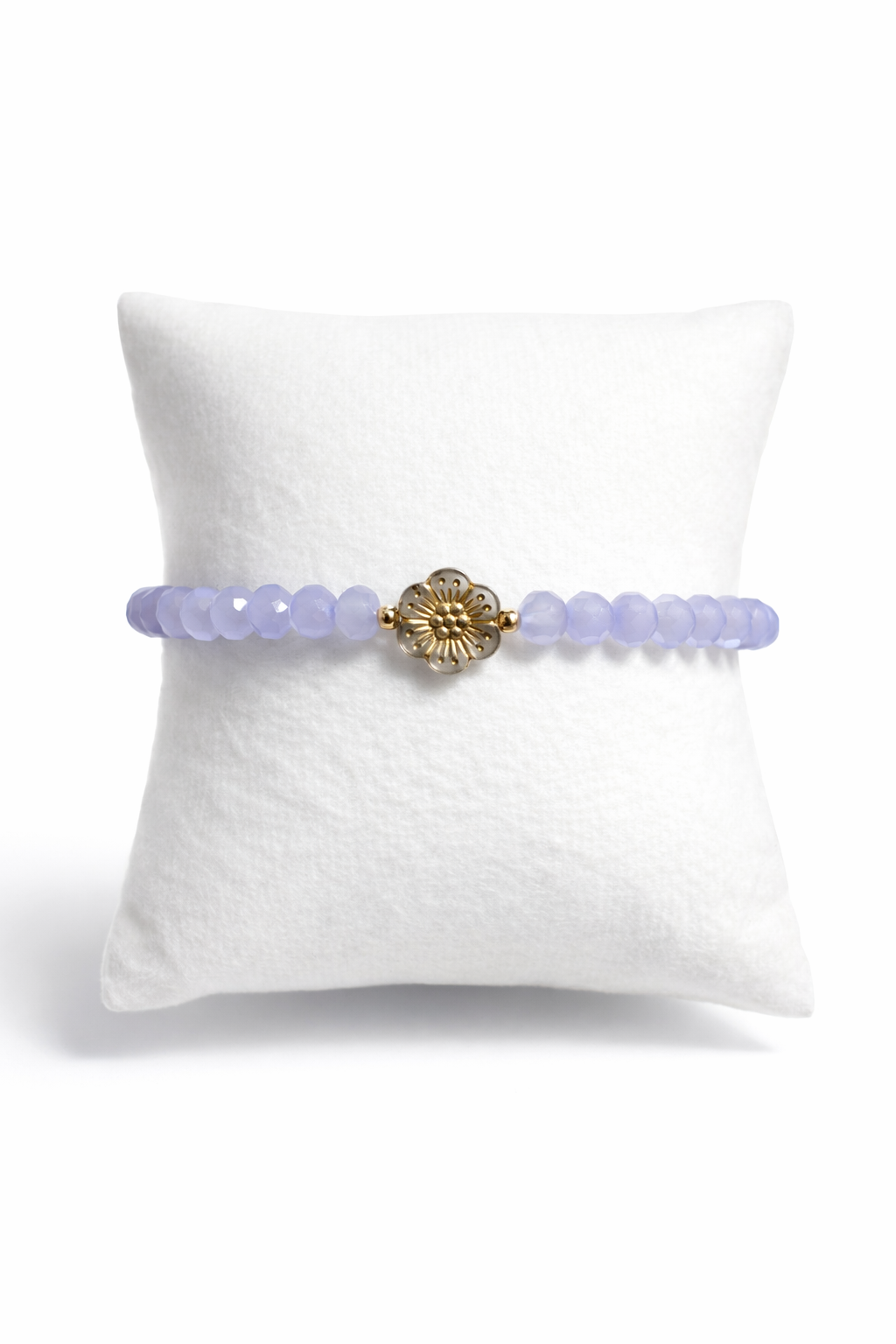 Armband lila mit Blume und goldene Details