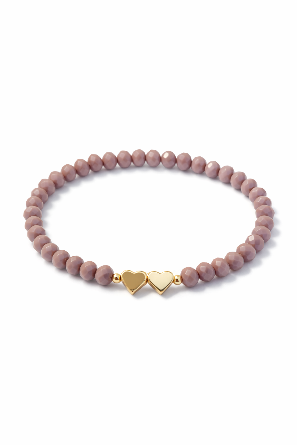 Bracelet in dusty rose with hearts and gold details