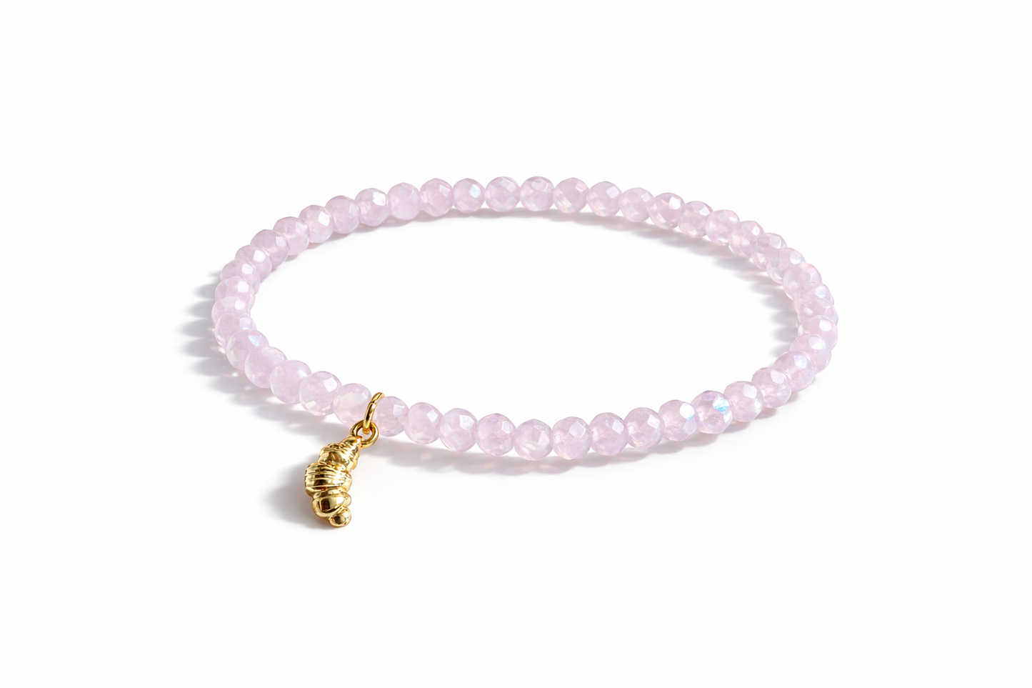 Pink bracelet with croissant pendant