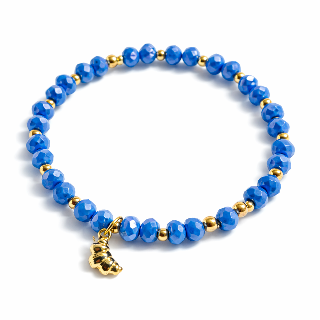 Blue bracelet with croissant pendant and gold details
