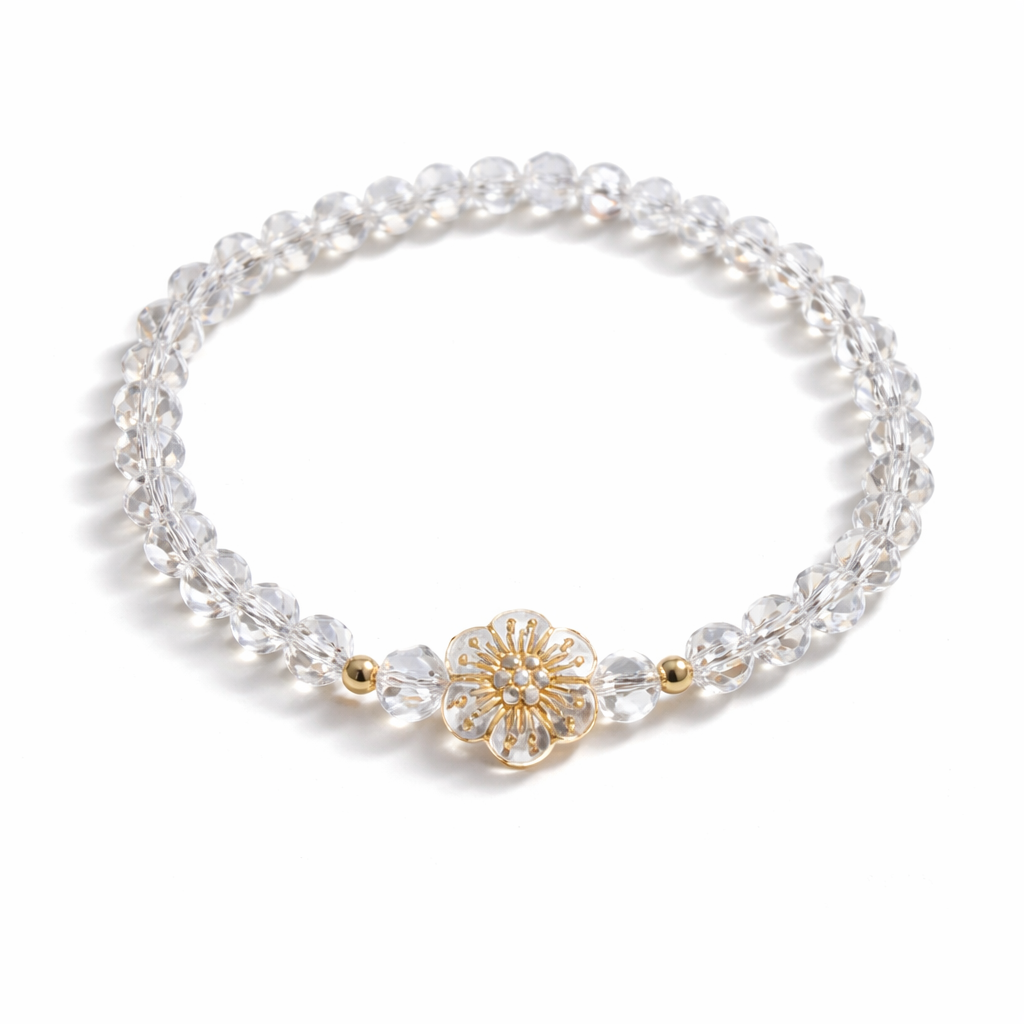 Armband Aus durchsichtigen Perlen mit Blume und goldenen Details