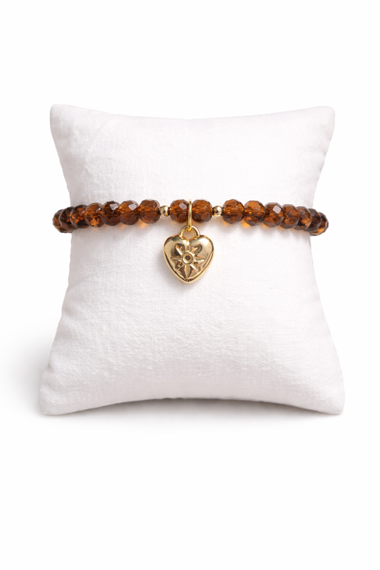 Brown bracelet with heart pendant