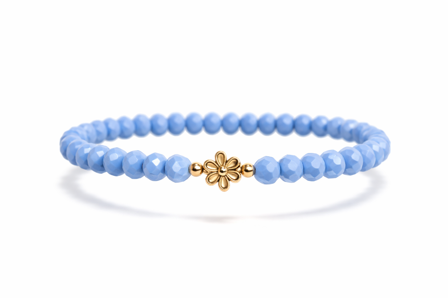 Blue bracelet with flower and gold details