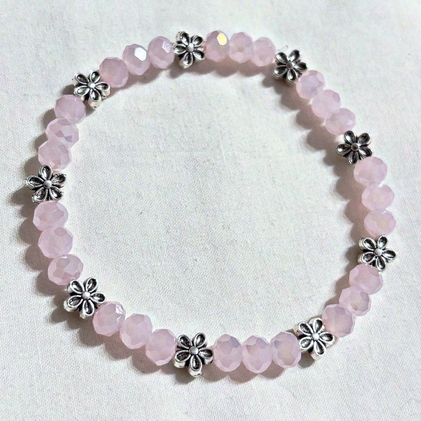 Armband rosa mit Blümchen