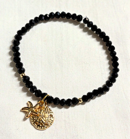 Armband schwarz mit Seestern- und Sanddollar-Anhänger
