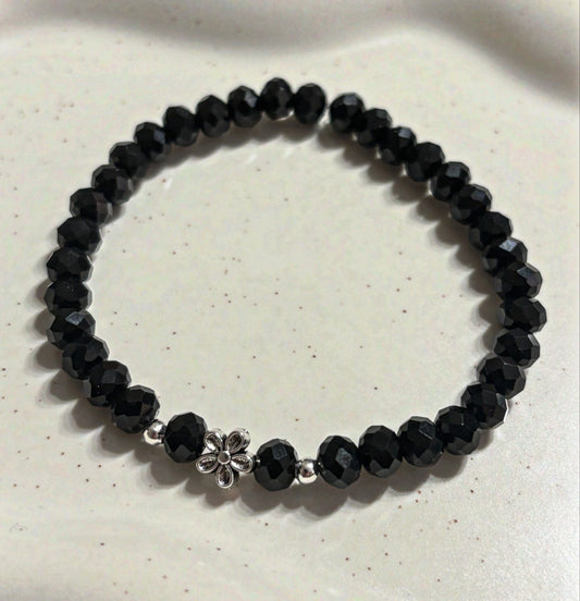 Armband schwarz mit Blümchen